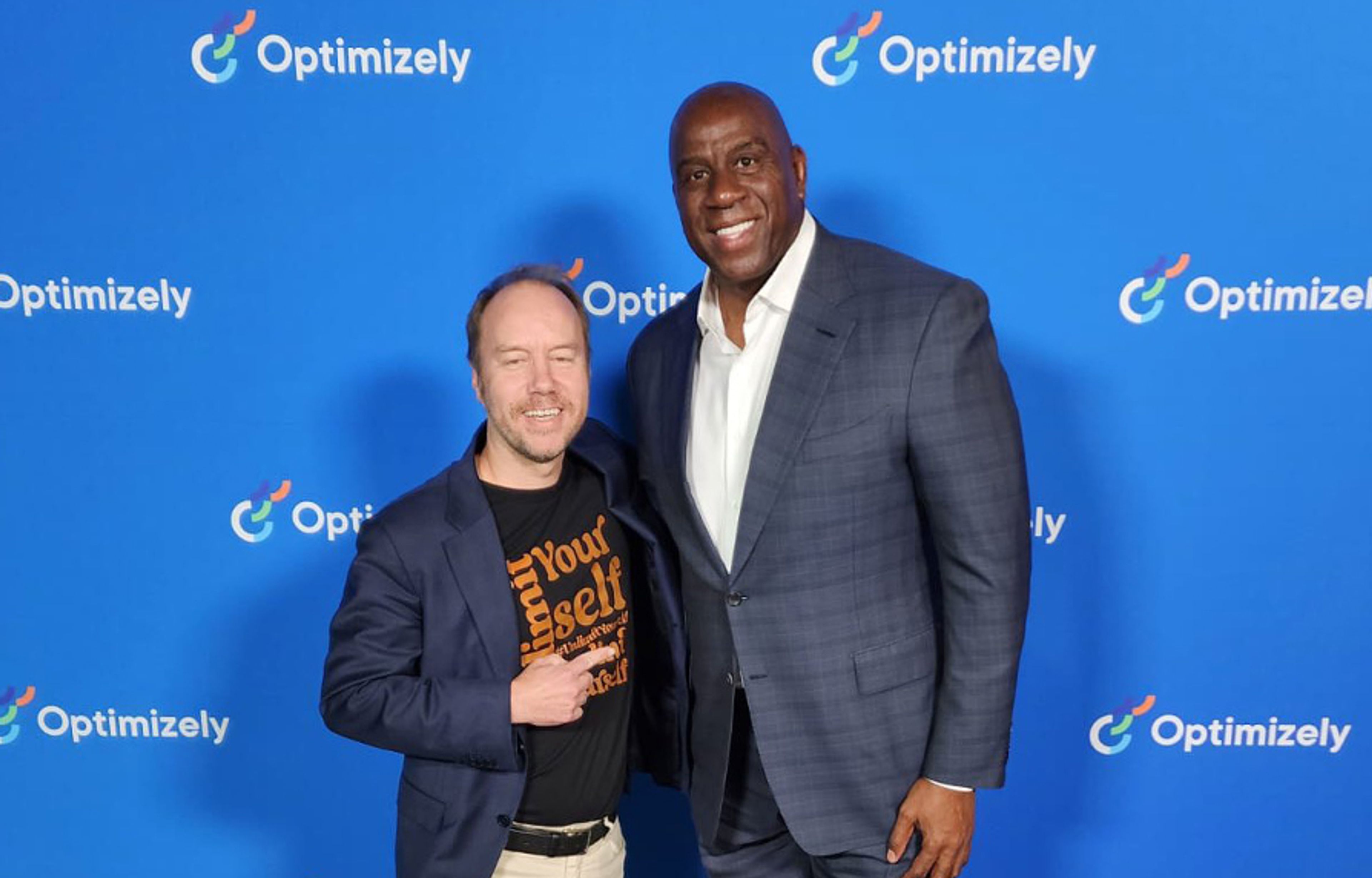 Image of Optimizely CEO Alex Atzberger with Earvin "Magic" Johnson at Opticon 2022