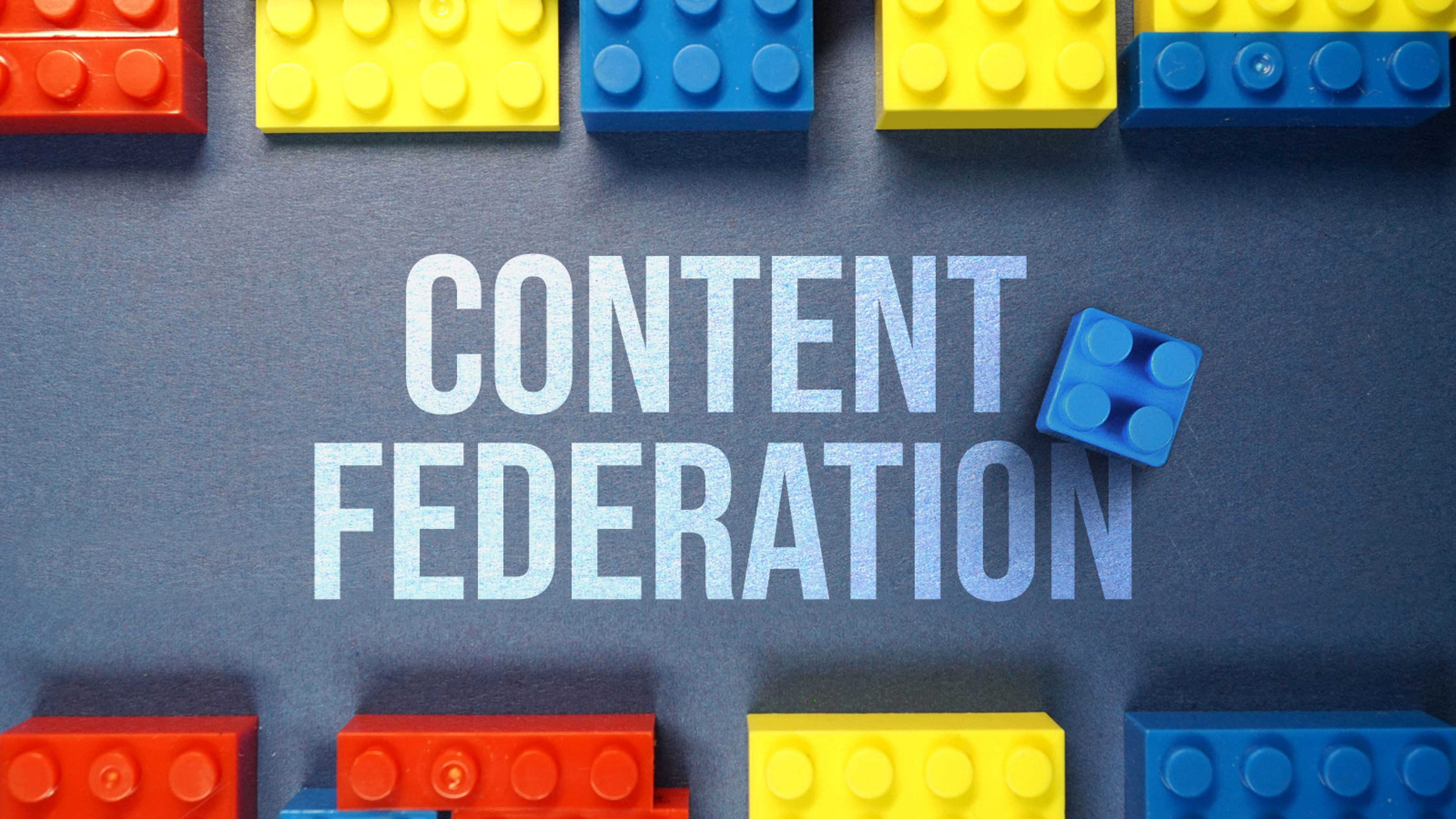 Legos with the words "Content Federation" in the center on a table