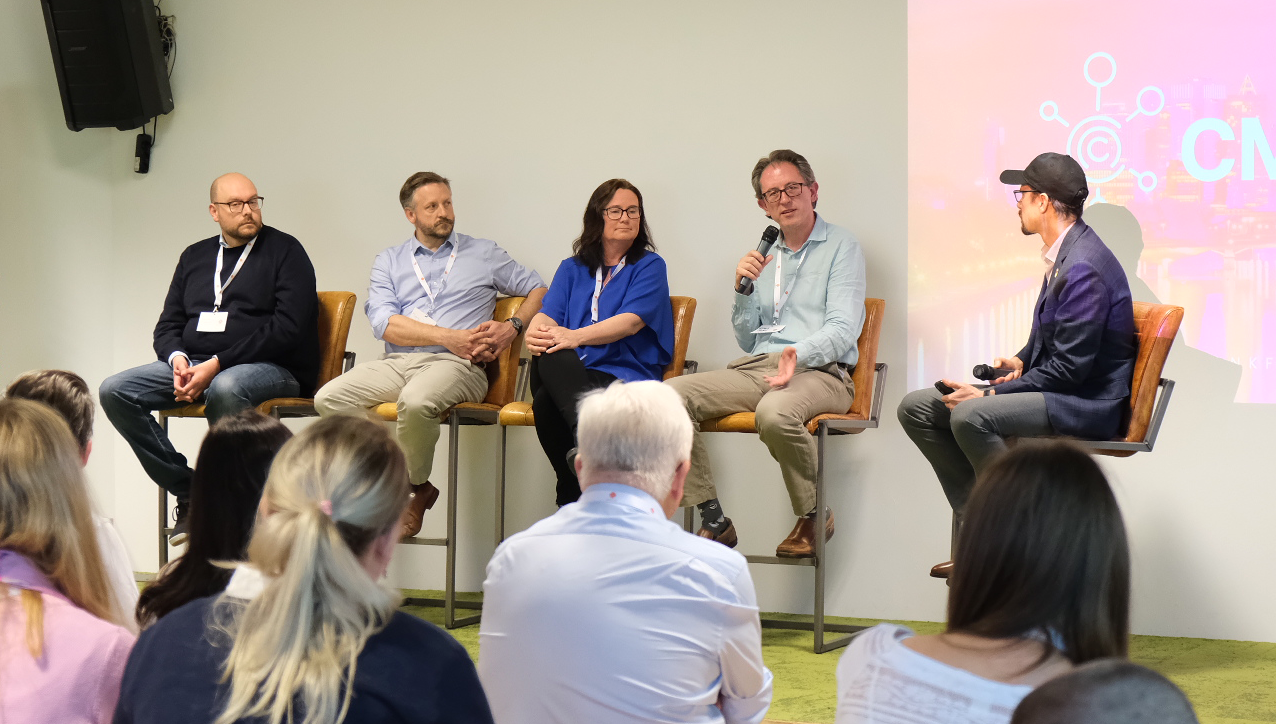 A group of people sitting in chairs

AI-generated content may be incorrect.