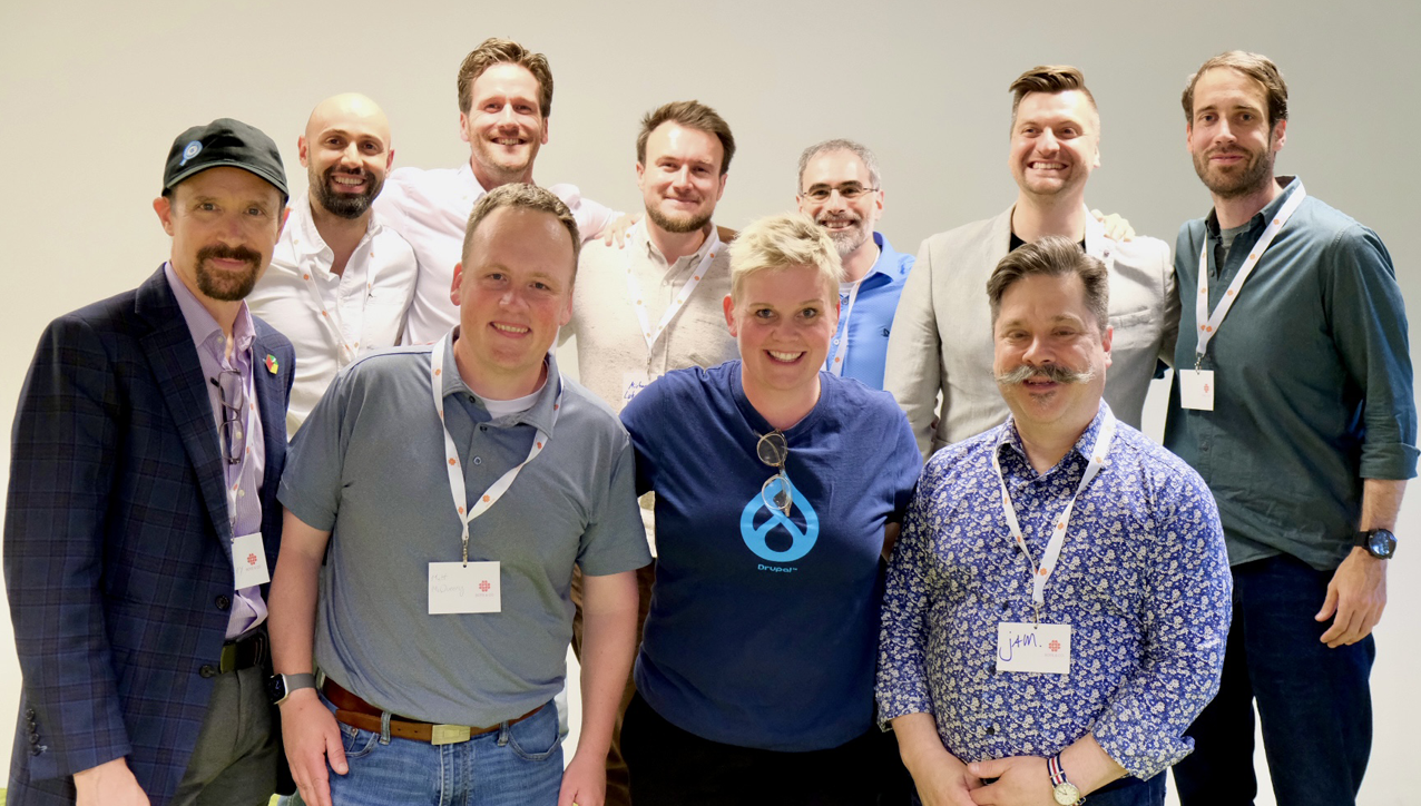 A group of people posing for a photo

AI-generated content may be incorrect.