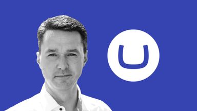 Martin Wülser Larsen headshot with Umbraco logo icon