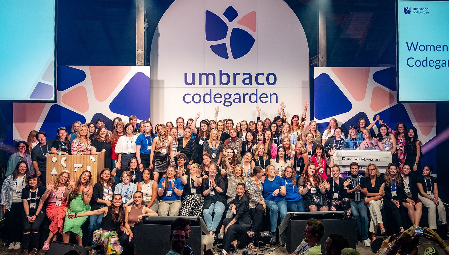 A group of people posing for a photo

AI-generated content may be incorrect.