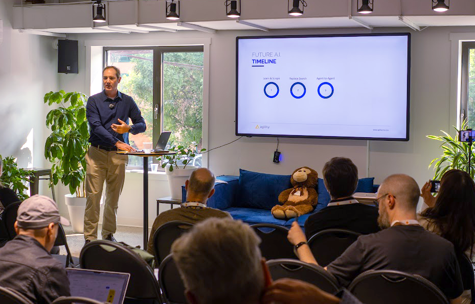 A person standing in front of a screen

AI-generated content may be incorrect.