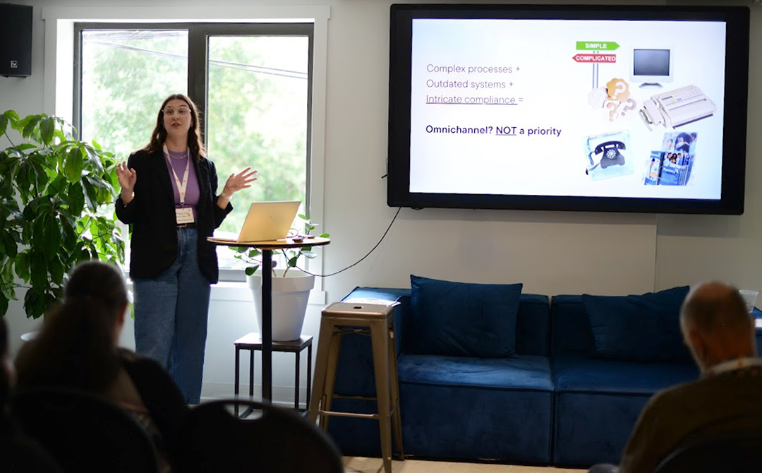 A person standing in front of a large screen

AI-generated content may be incorrect.