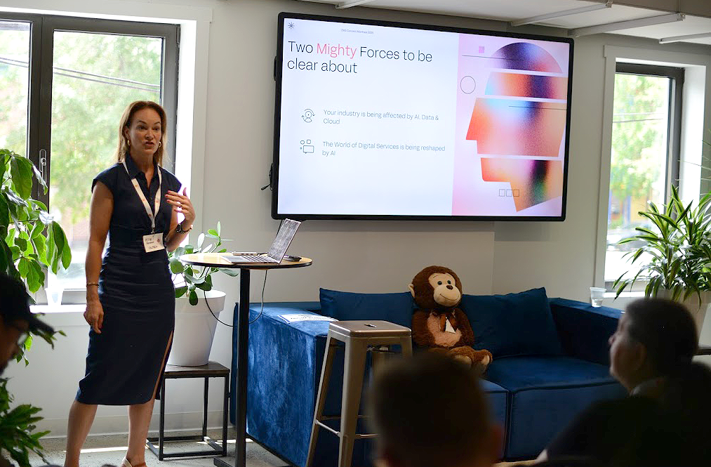 A person standing in front of a projector screen

AI-generated content may be incorrect.