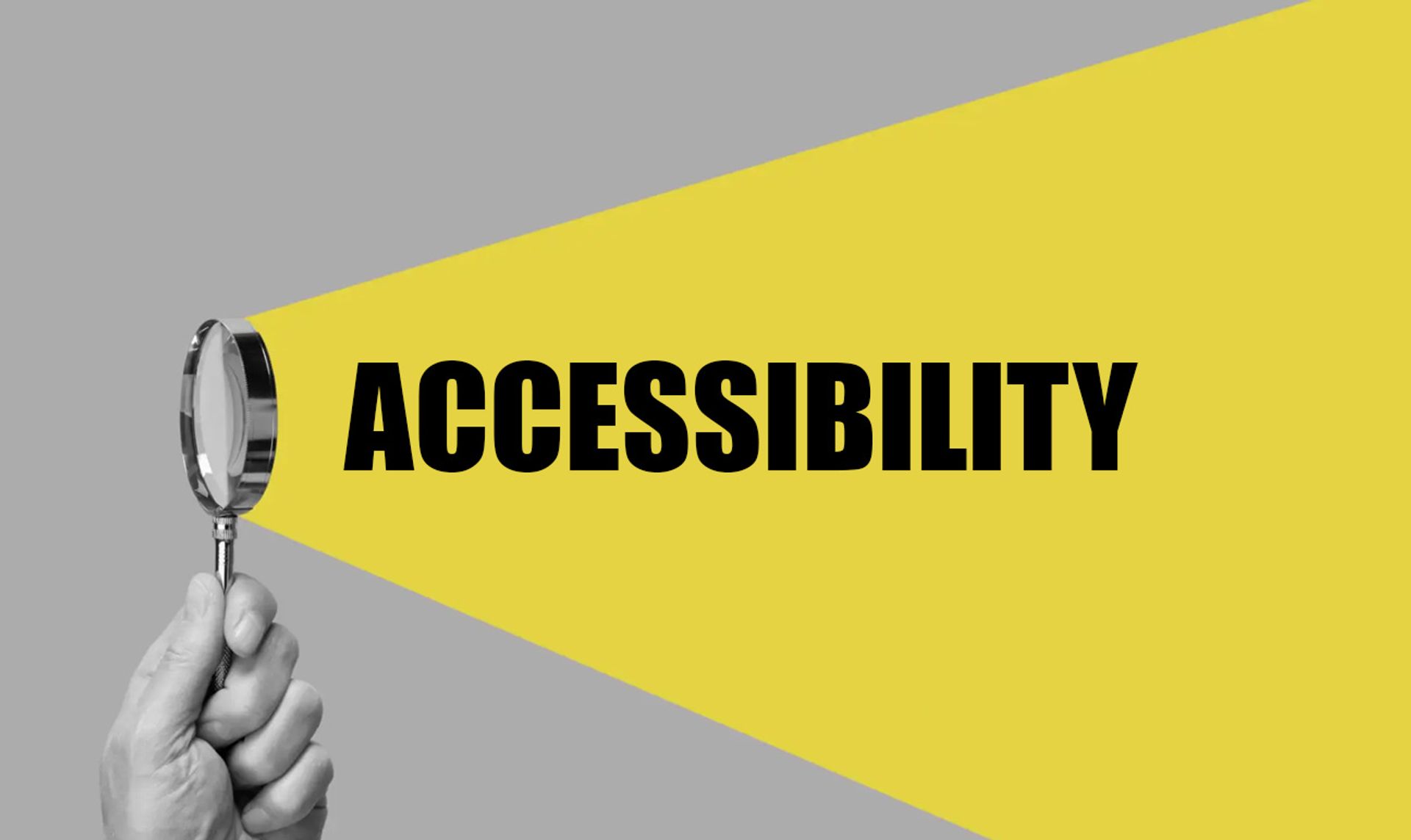 A magnifying glass in a man's hand, with a beam of yellow light shooting out. Within the beam, the word "ACCESSIBILITY" appears.
