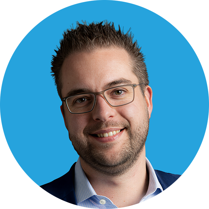 A person wearing glasses and a blue shirt

AI-generated content may be incorrect.