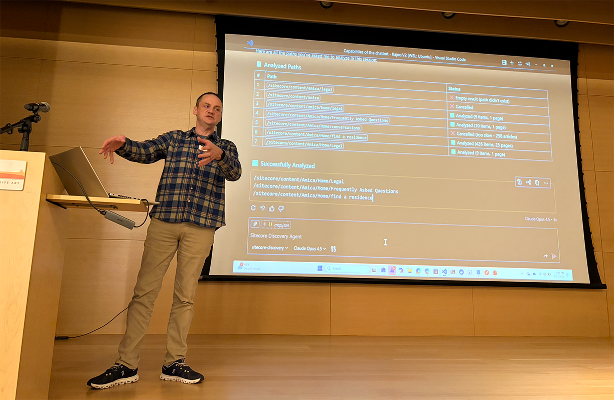 A person standing in front of a large screen
AI-generated content may be incorrect.