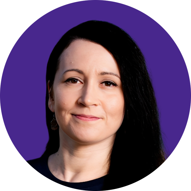 A person with dark hair and a purple background

AI-generated content may be incorrect.